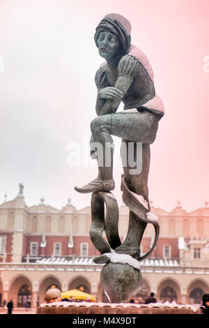 Krakau, Polen - 12. Februar 2018 Statue von Student an mariacki Square, Winter, Stockfoto