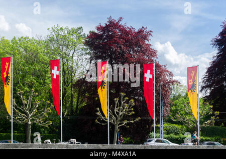 Genf Schweiz Flagge und Wappen Flagge im Wechsel zu Genf, Schweiz Stockfoto