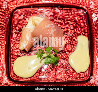 Pear tempura Parmaschinken Stockfoto