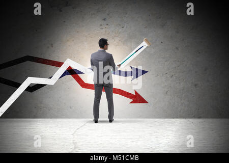 Der Geschäftsmann Zeichnen von Diagrammen in Prognosen Konzept Stockfoto