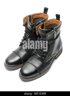 Ein Paar schwarze Lederstiefel isoliert auf weißem Hintergrund Stockfoto