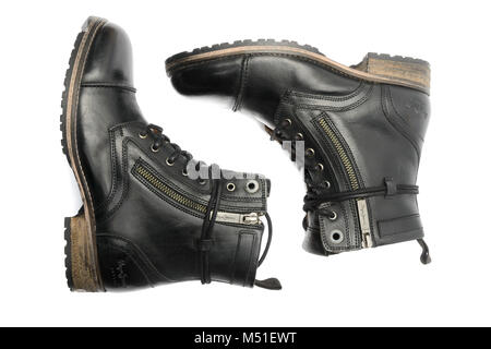 Ein Paar schwarze Lederstiefel isoliert auf weißem Hintergrund Stockfoto