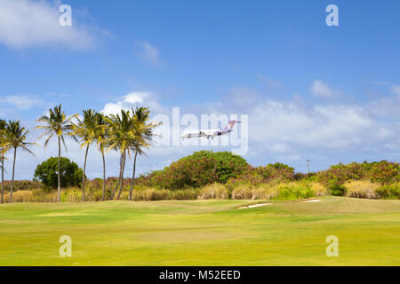 Ein Flugzeug Landung in Hawaii kawaii mit Sun Stockfoto