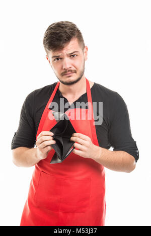 Supermarkt Arbeitgeber zeigen leer Lederetui Suche verwirrt isoliert auf weißem Hintergrund Stockfoto