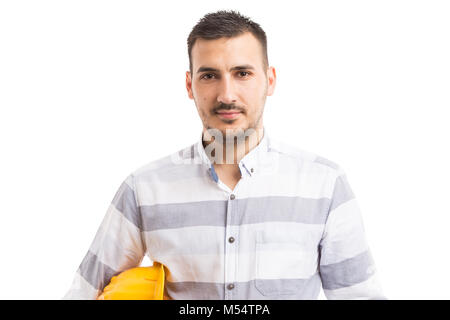 Porträt der jungen hardhat Arbeiter auf weiße studio Hintergrund mit Copyspace und Text Bereich lokalisiert Stockfoto