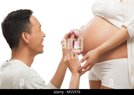 Schwangere Frau mit ihrem Ehemann. Stockfoto