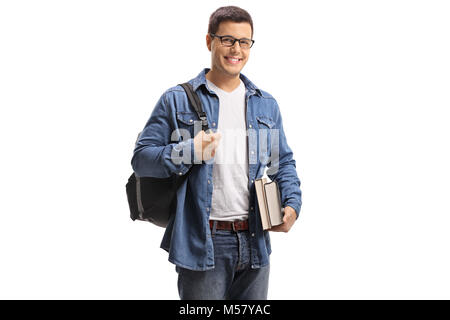 Studenten mit einem Rucksack und Bücher in die Kamera schaut und lächelnd auf weißem Hintergrund Stockfoto