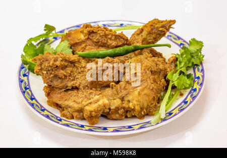 Beliebte indische Essen Essen der würzigen Soße mutton Curry wie Hammel kosha mit grünem Chili und Koriander Blätter bekannt. Stockfoto