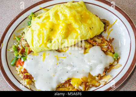 Florida Hialeah Gardens, Denny's, Restaurants, Restaurants, Restaurants, Restaurants, Cafés, Ultimate Omelette, Omelette, Hash Browns, Essen, Teller, Gericht, Frühstück, Sauce, FL0 Stockfoto