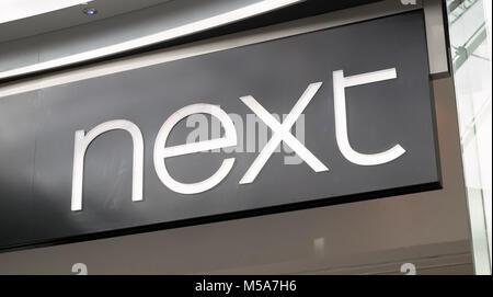 Nächsten Store anmelden Logo UK Stockfoto