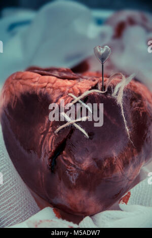 Eine geflickte gebrochenes Herz-genäht Stockfoto