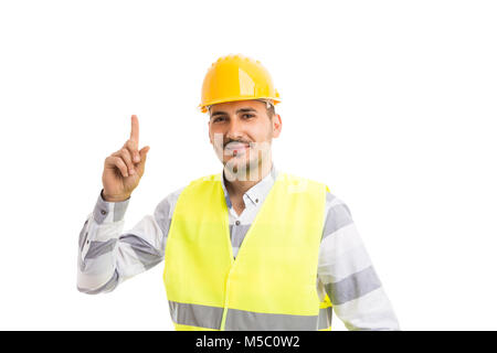 Smart Architekt oder Ingenieur in einer großen Idee lächelnd mit dem Zeigefinger auf weißem Hintergrund Stockfoto