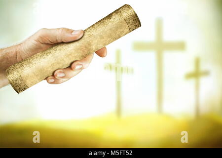 Eine Hand, die Botschaft vom Kreuz des Herrn Jesus. Stockfoto