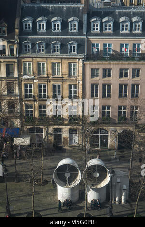 Famous Beaubourg pipes in front of the Belgium cultural center in typical Parisian buildings Stockfoto