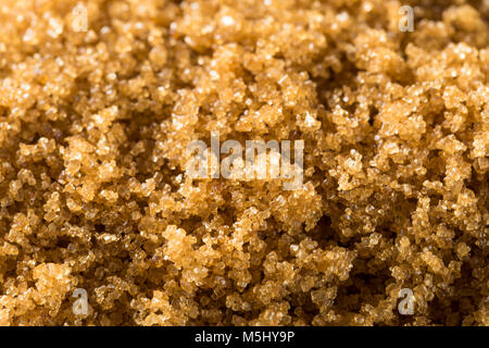 Raw Organic Light Brown Sugar in einem Stapel Stockfoto