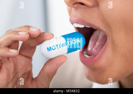 Close-up Foto Frau unter Motivation Pille Stockfoto