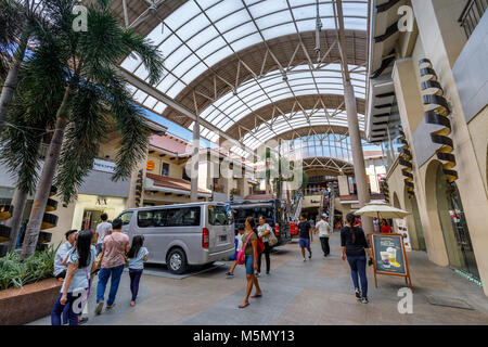 Manila, Philippinen - Feb 24, 2018: Bau der Alabang Town Center in Manila City Stockfoto