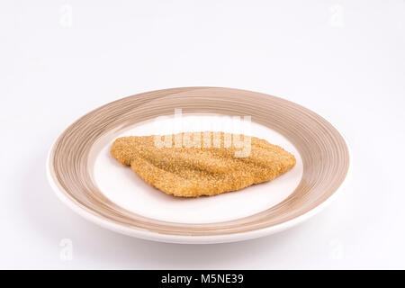 Ein schollenfilet paniert auf der Platte eingefroren Stockfoto
