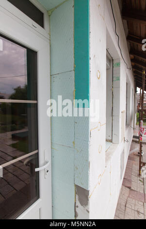 Gebäudedämmung - Closeup Fassade Polystyrol zu verankern. Stockfoto