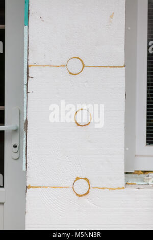 Gebäudedämmung - Closeup Fassade Polystyrol zu verankern. Stockfoto