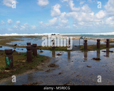 Asan Strand Überschwemmungen. Schäden im Jahr 2009 von Überschwemmungen in den Küstengebieten bei Asan Strand im Krieg im Pazifik National Historical Park, Guam Stockfoto