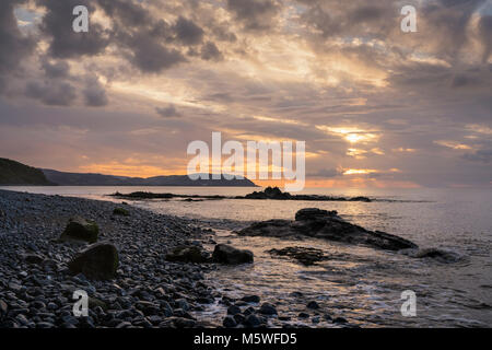 Sonnenuntergang an der Küste in der Nähe von Somerset Watchet über Blue Anchor Bay in Richtung Minehead Stockfoto