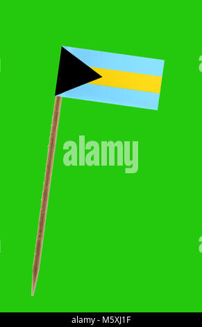 Zahn pick Witz ein kleines Papier Flagge der Bahamas auf einem Green Screen für chromakey Stockfoto