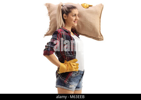 Frau Bauer Holding eine sackleinen Sack auf weißem Hintergrund Stockfoto