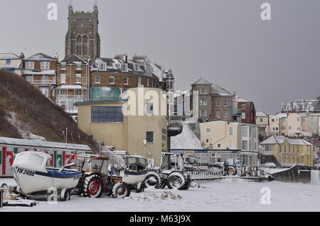 Fahren Schnee auf der Promenade in Cromer, Norfolk, Großbritannien Stockfoto