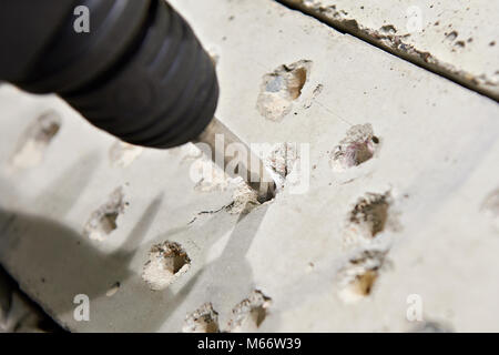 Bohrer zum Bohren von Beton Stockfoto