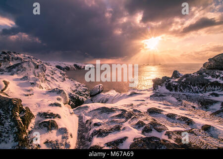 Sennen Schneesturm Sonnenuntergang, Cornwall, Großbritannien Stockfoto