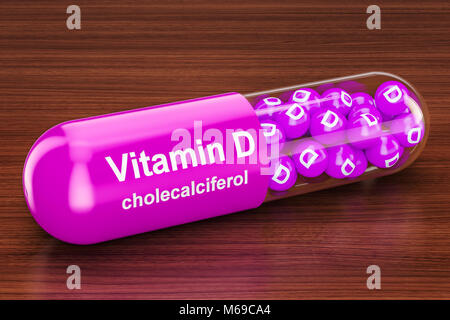 Vitamin-D-Kapsel auf dem Holztisch. 3D-Rendering Stockfoto