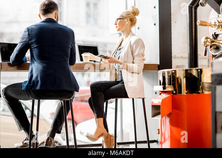 Business Paar im Cafe Stockfoto