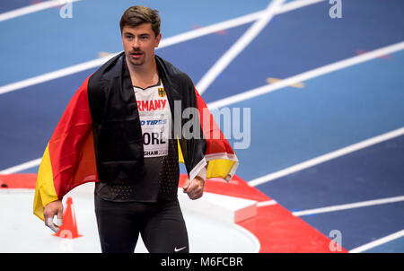 Birmingham, Großbritannien. 03 Mär, 2018. 03 März 2018, Großbritannien, Birmingham: Kugelstoßen, Männer. Deutschlands David Storl feiern Silber gewinnen. Credit: Sven Hoppe/dpa/Alamy leben Nachrichten Stockfoto