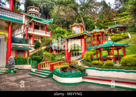 Die Glocke der Kirche ist ein taoistischer Tempel mit Gärten, Tempeln und Pagoden für die Öffentlichkeit zugänglich in Baguio City, Insel Luzon, Philippinen. Stockfoto