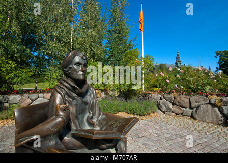 Statue von Astrid Lindgren (Buch der berühmten Kinder Thema, einschließlich Pippi Langstrumpf) in der Nähe des Museum Junibacken, Djurgården, Stockholm, Schweden Stockfoto