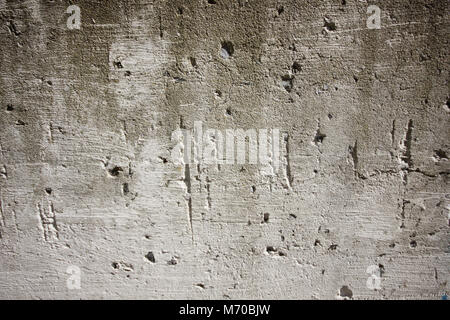 Nahaufnahme der Textur eines gealterten Betonwand. Stockfoto