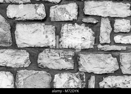 Muster der Steinmauer aufgetaucht Stockfoto