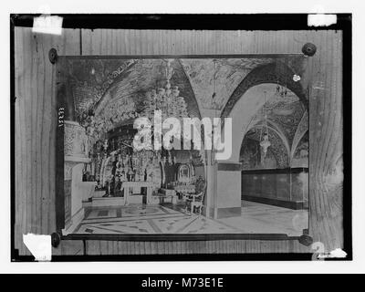 Dieses Foto zeigt die griechischen und lateinischen Kapellen, die sich auf Kalvaria innerhalb der Grabeskirche in Jerusalem befinden, eine wichtige religiöse Stätte für das Christentum. Stockfoto