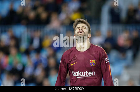 Malaga, Spanien. 9. März, 2018. LaLiga Fußballspiel zwischen Malaga CF vs FC Barcelona im La Rosaleda Stadion, Pique. © ABEL F. ROS/Alamy leben Nachrichten Stockfoto