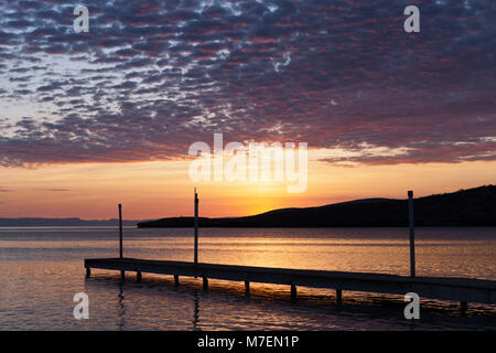 Jetty und Meer bei Sonnenuntergang, La Paz, Baja California Sur, Mexiko Stockfoto