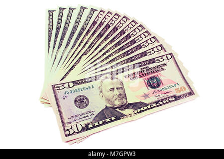 Dollar breiten sich wie ein Ventilator auf weißem Hintergrund. Stockfoto