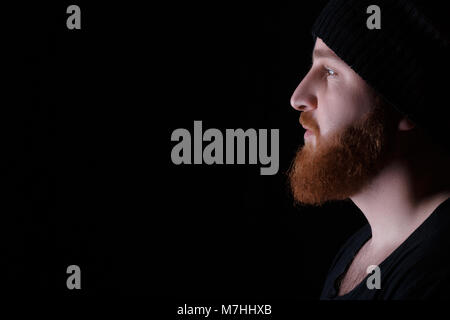 Bärtiger Mann mit Hut Stockfoto