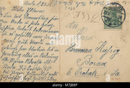 Eine historische Postkarte des Hafens in Stade, Niedersachsen, zeigt das Hafengebiet in Norddeutschland. Das Bild bietet einen Einblick in die Uferpromenade und die lokale Infrastruktur. Stockfoto