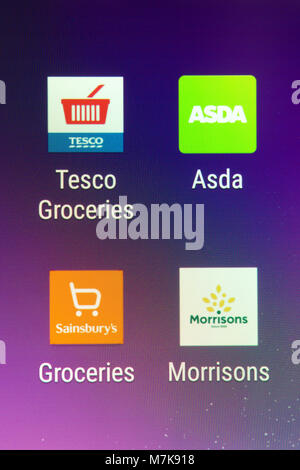Apps auf einem Smartphone für Britische Supermärkte die "grossen Vier" Stockfoto