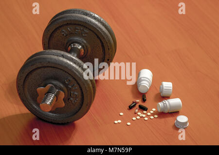 Steroid Pillen und Kapseln mit hantel Gewicht im Hintergrund - Doping im Sport. Stockfoto