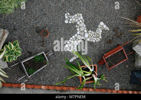 Ein Garten in Ramsey während der 100-Jahrfeier TT Rennen auf der Isle of Man http://www.iomtt.com/History.aspx Stockfoto