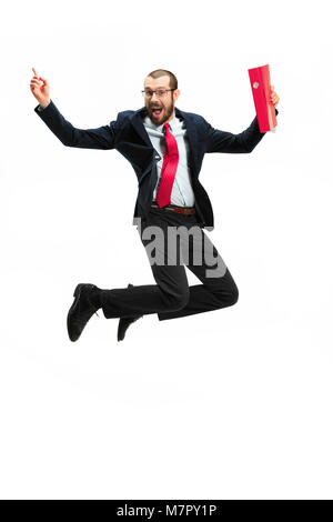 Lustig heiter Geschaeftsmann in der Luft über weißen Hintergrund springen Stockfoto