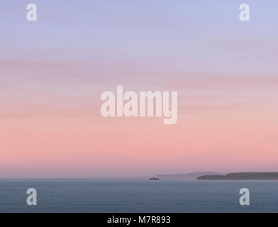 Sonnenuntergang über die Bucht von St Ives nach Norden zu Godrevy. Stockfoto