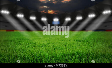 Leere Arena mit grünem Gras Beleuchtung in der Nacht Stockfoto